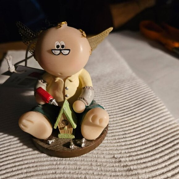 Angel Cheek Building Birdhouse - Picture 1 of 1